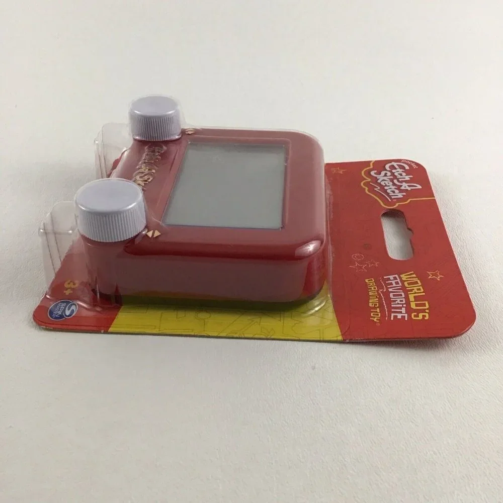 Pocket Etch A Sketch World's Favorite Drawing Toy Draw Shake Erase Spin Master